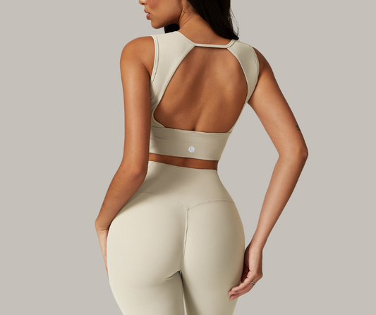 Sleek, supportive, and designed to empower—these sculpt bras feature bold silhouettes with flattering cuts. The open-back style adds breathability and flair, while the square-neck design offers secure support and full coverage. Perfect for yoga, strength training, barre, or simply moving through your day with confidence