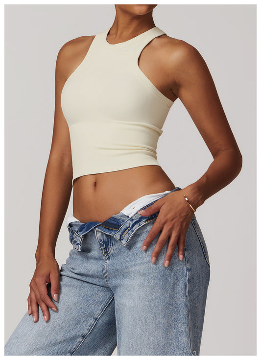 A sporty essential with a sleek fit, this ribbed racerback tank features stretch fabric and a breathable design—ideal for light fitness activities like yoga, Pilates, or active errands in style