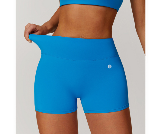 Flatter your curves with these high-waisted, scrunch-back shorts. Made from soft, sweat-wicking stretch fabric—perfect for gym, yoga, or all-day wear.