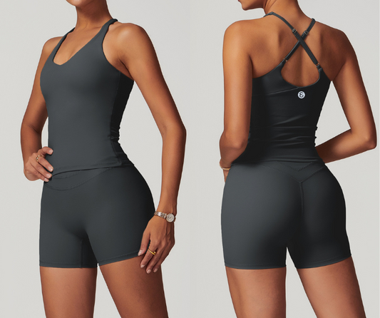 This sleek longline tank features a flattering scoop neckline and adjustable strappy back for a custom fit. Crafted from smooth, stretch fabric for comfort and support—perfect for yoga, Pilates, barre, and light training sessions