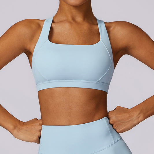 supportive cross-back sports bra with removable padding. Made from 78% polyamide and 22% elastane for comfort, flexibility, and breathability. Perfect for gym, yoga, or daily activewear.