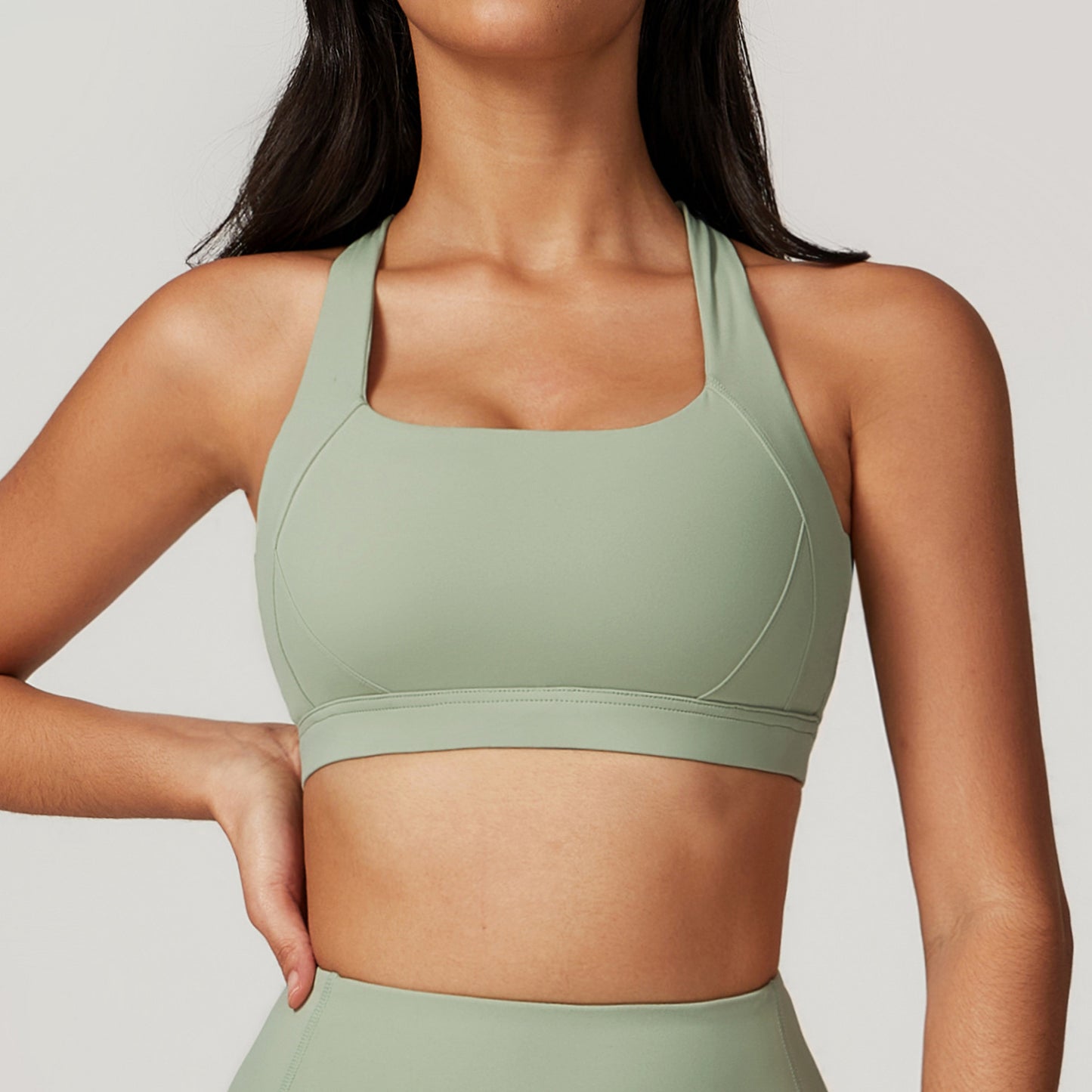 supportive cross-back sports bra with removable padding. Made from 78% polyamide and 22% elastane for comfort, flexibility, and breathability. Perfect for gym, yoga, or daily activewear.