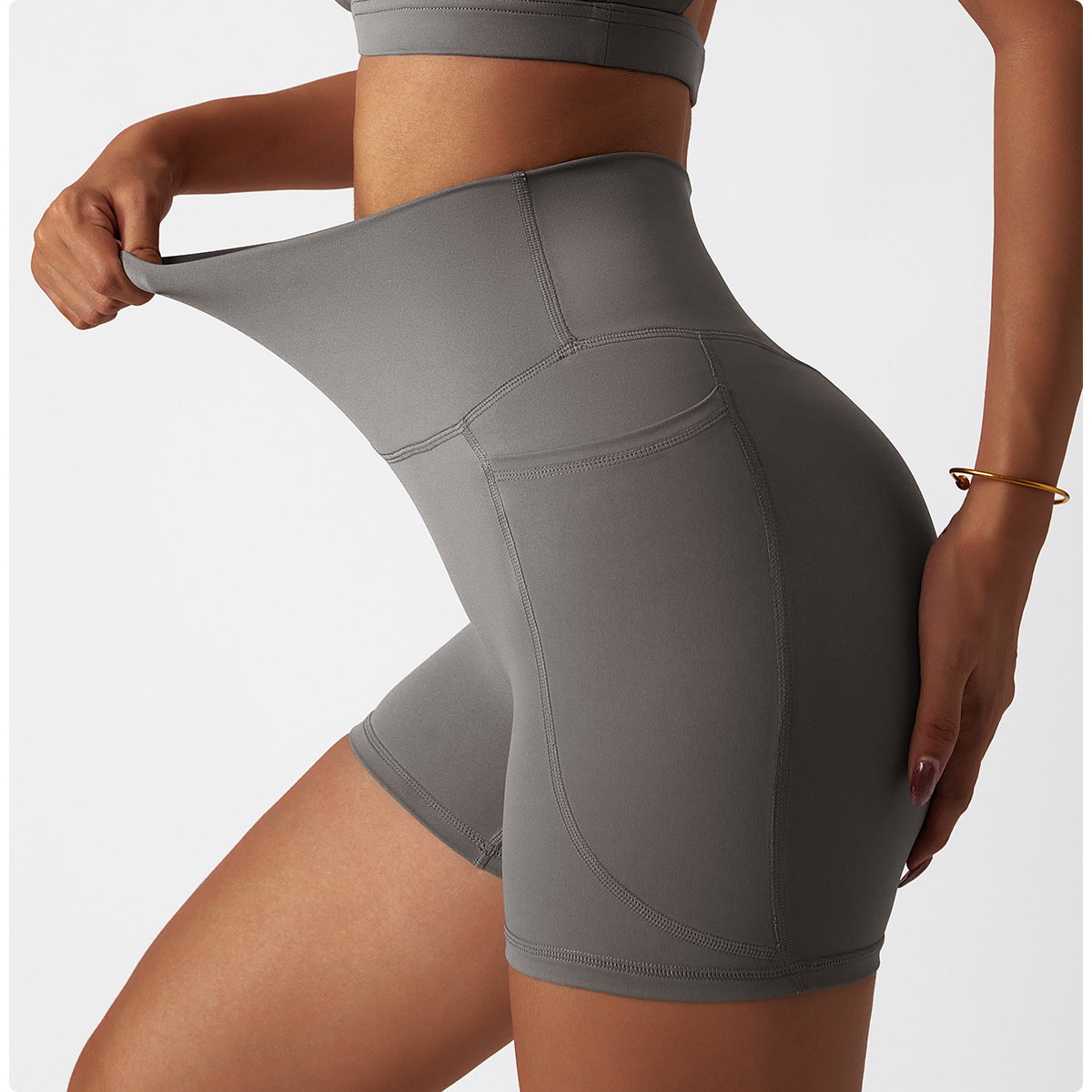 sleek, sculpting, and supportive. Featuring a high waist, side pockets, and flexible stretch that flatters every shape.