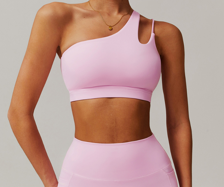 Turn heads with this sleek one-shoulder sports bra, featuring a modern cutout design and supportive stretch fabric—ideal for low to medium-impact workouts or stylish everyday wear.