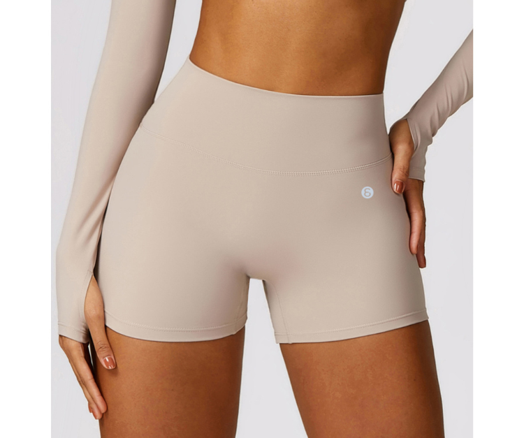Flatter your curves with these high-waisted, scrunch-back shorts. Made from soft, sweat-wicking stretch fabric—perfect for gym, yoga, or all-day wear.