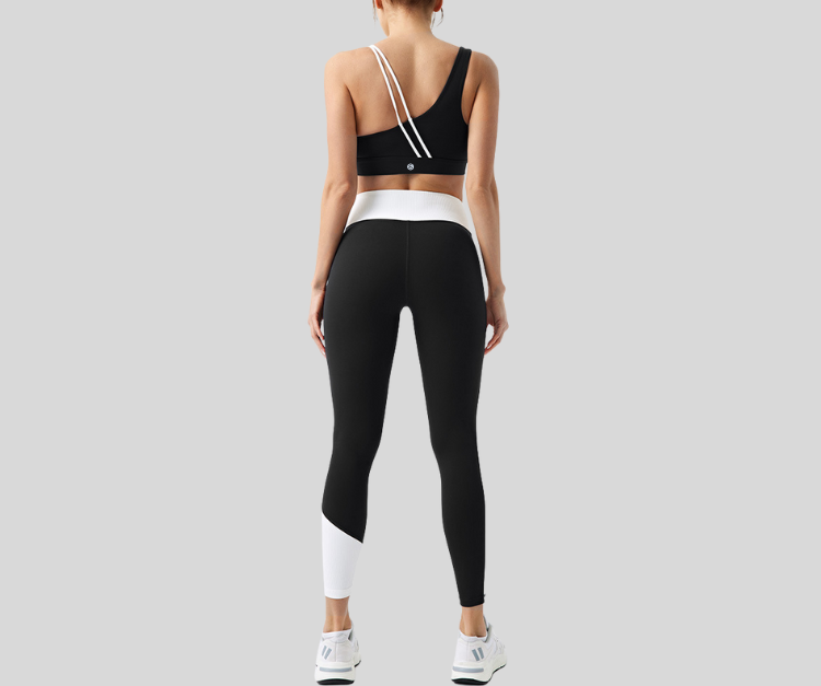 Stand out in this vibrant ribbed set, featuring a double-strap sports bra and matching high-waisted leggings with bold color block details. The top offers light to medium support with a stylish open-back design, while the leggings sculpt and move with you in all the right places.

Fitness Suitability:
Perfect for Strength Training, yoga, Pilates, walking, and light to moderate workouts—ideal for staying supported while looking effortlessly bold.