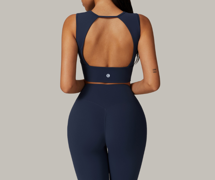 Sleek, supportive, and designed to empower—these sculpt bras feature bold silhouettes with flattering cuts. The open-back style adds breathability and flair, while the square-neck design offers secure support and full coverage. Perfect for yoga, strength training, barre, or simply moving through your day with confidence