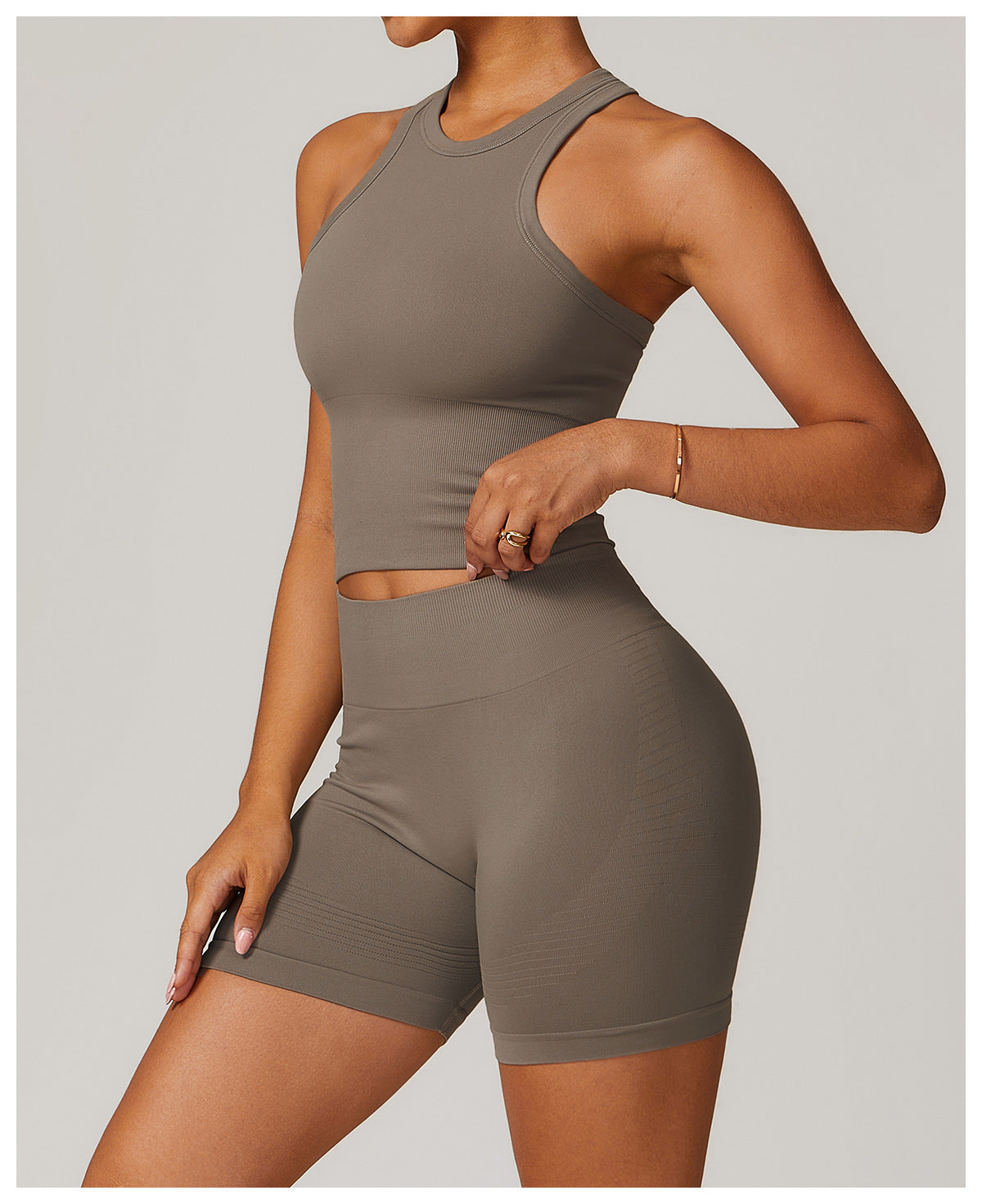 A sporty essential with a sleek fit, this ribbed racerback tank features stretch fabric and a breathable design—ideal for light fitness activities like yoga, Pilates, or active errands in style