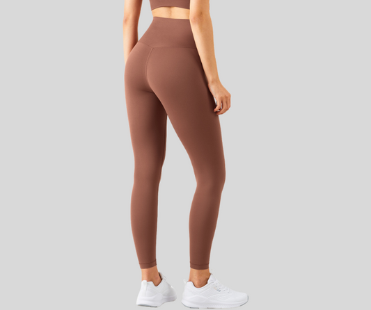 Designed for a sleek, supportive fit, these high-waisted leggings offer smooth compression and a sculpting silhouette. Made with moisture-wicking, 4-way stretch fabric to move with you through every rep.

Fitness Suitability:
Perfect for strength training, running, HIIT, yoga, and everyday active wear.