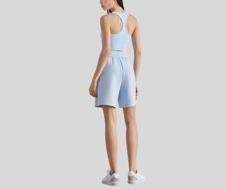This racerback bra offers a supportive fit with a wide scoop neckline and stretchy, breathable fabric for all-day ease. The sleek, full-coverage design makes it a go-to for movement and style.