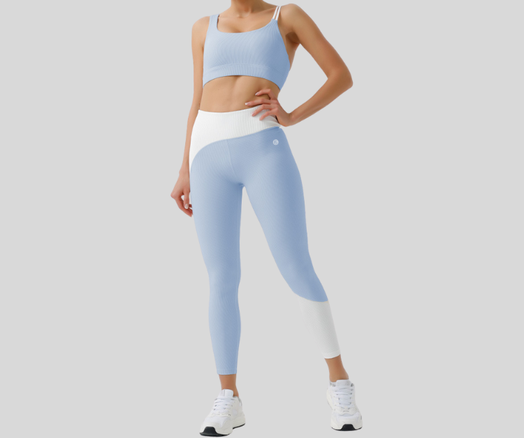 Stand out in this vibrant ribbed set, featuring a double-strap sports bra and matching high-waisted leggings with bold color block details. The top offers light to medium support with a stylish open-back design, while the leggings sculpt and move with you in all the right places.

Fitness Suitability:
Perfect for Strength Training, yoga, Pilates, walking, and light to moderate workouts—ideal for staying supported while looking effortlessly bold.