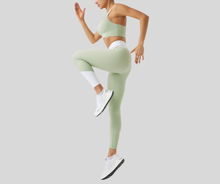 Stand out in this vibrant ribbed set, featuring a double-strap sports bra and matching high-waisted leggings with bold color block details. The top offers light to medium support with a stylish open-back design, while the leggings sculpt and move with you in all the right places.

Fitness Suitability:
Perfect for Strength Training, yoga, Pilates, walking, and light to moderate workouts—ideal for staying supported while looking effortlessly bold.