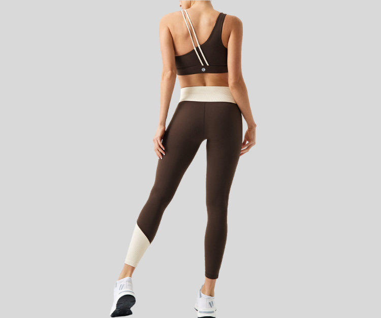 Stand out in this vibrant ribbed set, featuring a double-strap sports bra and matching high-waisted leggings with bold color block details. The top offers light to medium support with a stylish open-back design, while the leggings sculpt and move with you in all the right places.

Fitness Suitability:
Perfect for Strength Training, yoga, Pilates, walking, and light to moderate workouts—ideal for staying supported while looking effortlessly bold.