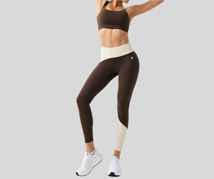 Stand out in this vibrant ribbed set, featuring a double-strap sports bra and matching high-waisted leggings with bold color block details. The top offers light to medium support with a stylish open-back design, while the leggings sculpt and move with you in all the right places.

Fitness Suitability:
Perfect for Strength Training, yoga, Pilates, walking, and light to moderate workouts—ideal for staying supported while looking effortlessly bold.