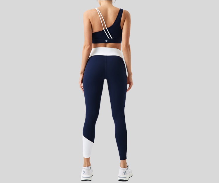 Stand out in this vibrant ribbed set, featuring a double-strap sports bra and matching high-waisted leggings with bold color block details. The top offers light to medium support with a stylish open-back design, while the leggings sculpt and move with you in all the right places.

Fitness Suitability:
Perfect for Strength Training, yoga, Pilates, walking, and light to moderate workouts—ideal for staying supported while looking effortlessly bold.