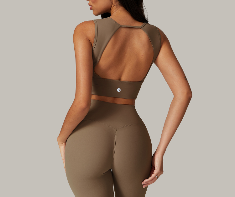 Sleek, supportive, and designed to empower—these sculpt bras feature bold silhouettes with flattering cuts. The open-back style adds breathability and flair, while the square-neck design offers secure support and full coverage. Perfect for yoga, strength training, barre, or simply moving through your day with confidence