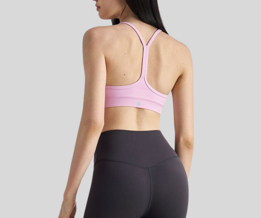 This sleek, sports bra features a minimalist scoop neckline and slim racerback straps for unrestricted movement. Made with breathable, stretch fabric for a barely-there feel and light to medium support.

Fitness Suitability:
Ideal for yoga, Pilates, barre, light gym sessions, or layering under activewear for all-day comfort.