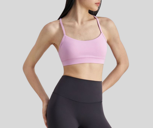 This sleek, sports bra features a minimalist scoop neckline and slim racerback straps for unrestricted movement. Made with breathable, stretch fabric for a barely-there feel and light to medium support.

Fitness Suitability:
Ideal for yoga, Pilates, barre, light gym sessions, or layering under activewear for all-day comfort.