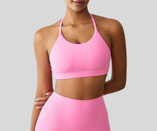 This vibrant sports bra features a flattering scoop neckline and stylish strappy back design for light to medium support. Crafted from soft, stretch fabric that moves with you while keeping you cool and comfortable.

Fitness Suitability:
Ideal for yoga, Pilates, barre, walking, and everyday active wear—perfect for low to moderate impact workouts with a bold, confident look.
