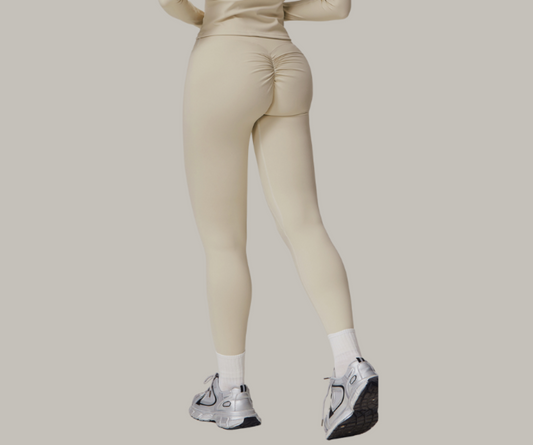 Boost your curves with these high-waisted leggings featuring a ruched back seam for a lifted look. Made from buttery-soft, stretch fabric—ideal for workouts or everyday wear.