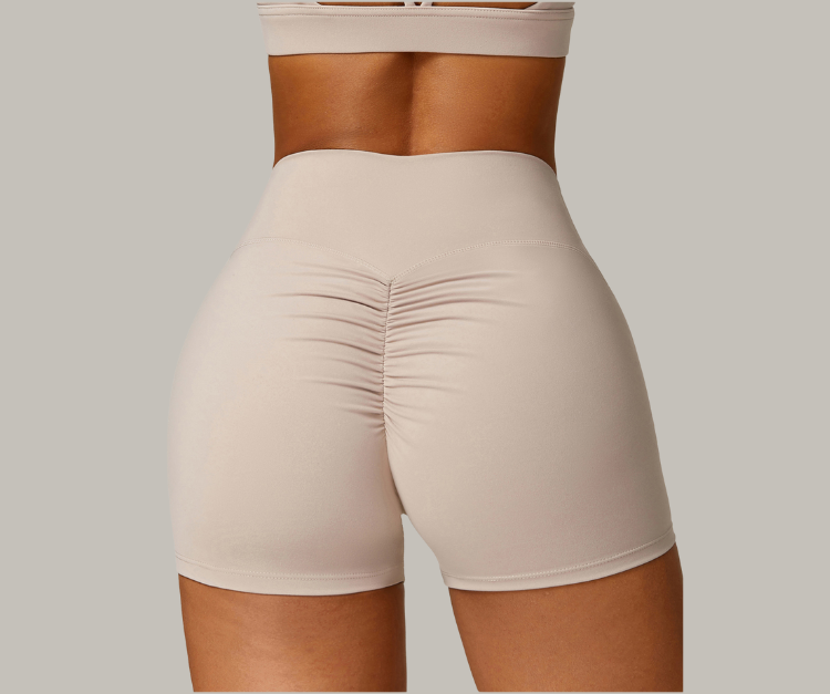 Flatter your curves with these high-waisted, scrunch-back shorts. Made from soft, sweat-wicking stretch fabric—perfect for gym, yoga, or all-day wear.