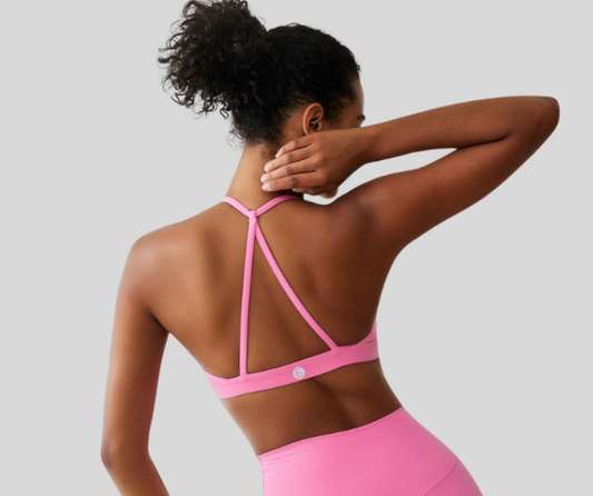 This vibrant sports bra features a flattering scoop neckline and stylish strappy back design for light to medium support. Crafted from soft, stretch fabric that moves with you while keeping you cool and comfortable.

Fitness Suitability:
Ideal for yoga, Pilates, barre, walking, and everyday active wear—perfect for low to moderate impact workouts with a bold, confident look.