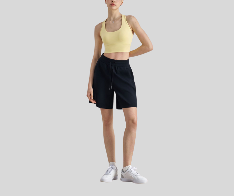 This racerback bra offers a supportive fit with a wide scoop neckline and stretchy, breathable fabric for all-day ease. The sleek, full-coverage design makes it a go-to for movement and style.