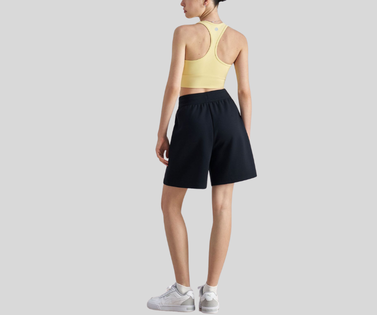 This racerback bra offers a supportive fit with a wide scoop neckline and stretchy, breathable fabric for all-day ease. The sleek, full-coverage design makes it a go-to for movement and style.
