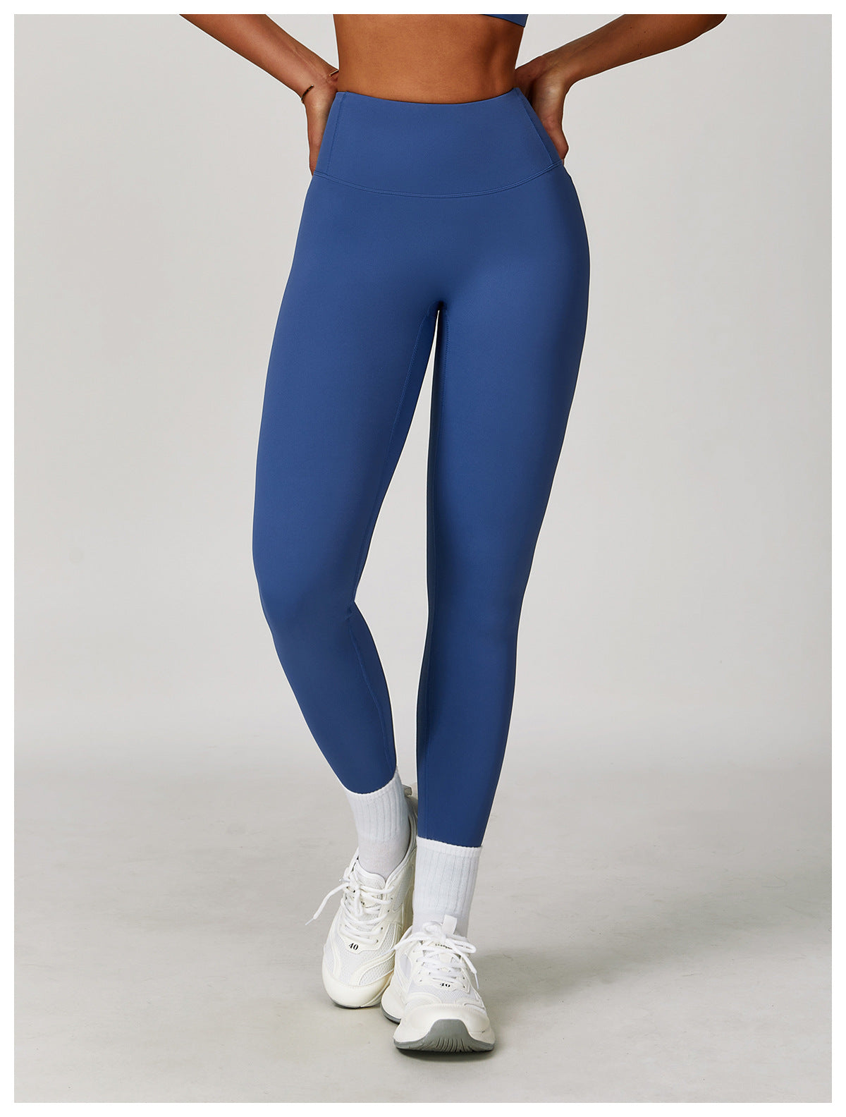 high-waist, body-sculpting leggings made from buttery-soft 78% polyamide & 22% elastane. Invisible pleated lift detail for natural curve enhancement. Ideal for gym, yoga, and daily wear.
